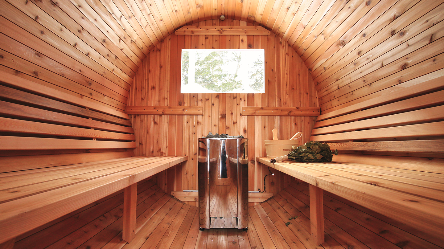 Enjoy a Finnish barrel sauna on the frozen Lake Akan!